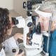 Optometrist with senior patient